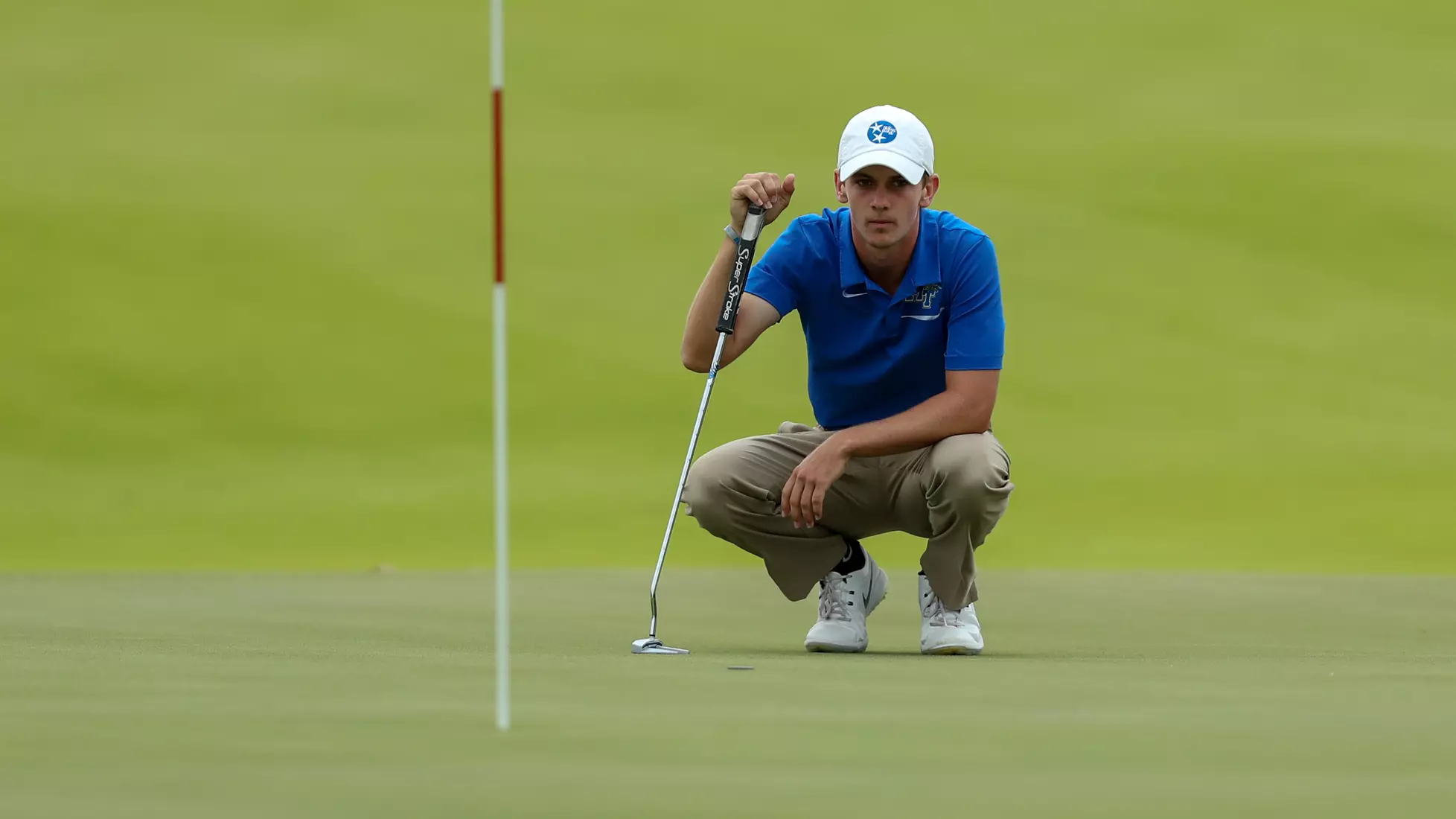 golfer standing with club