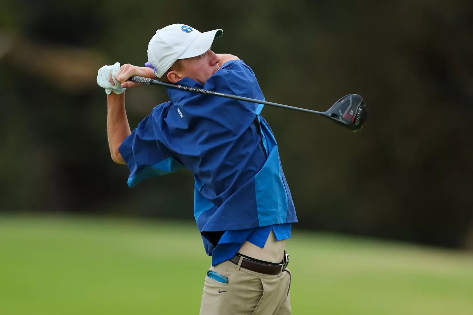 golfer standing with club