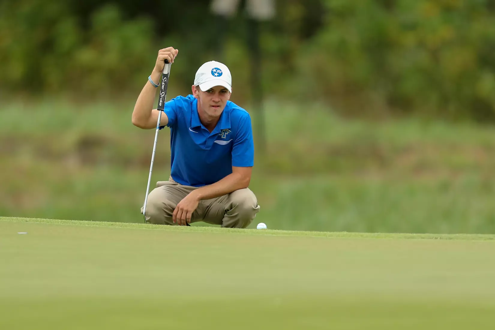 golfer standing with club