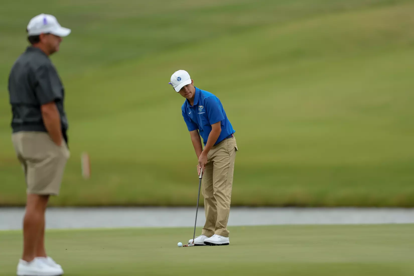 golfer standing with club