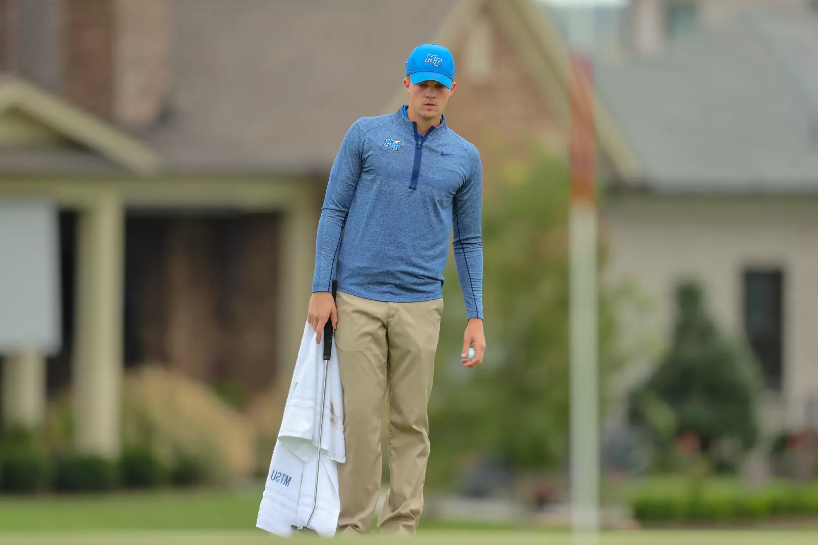 golfer standing with club