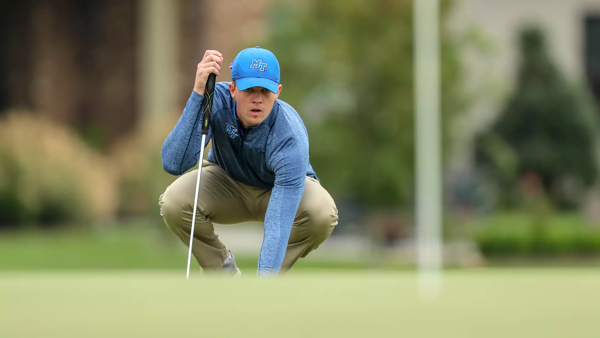 golfer standing with club