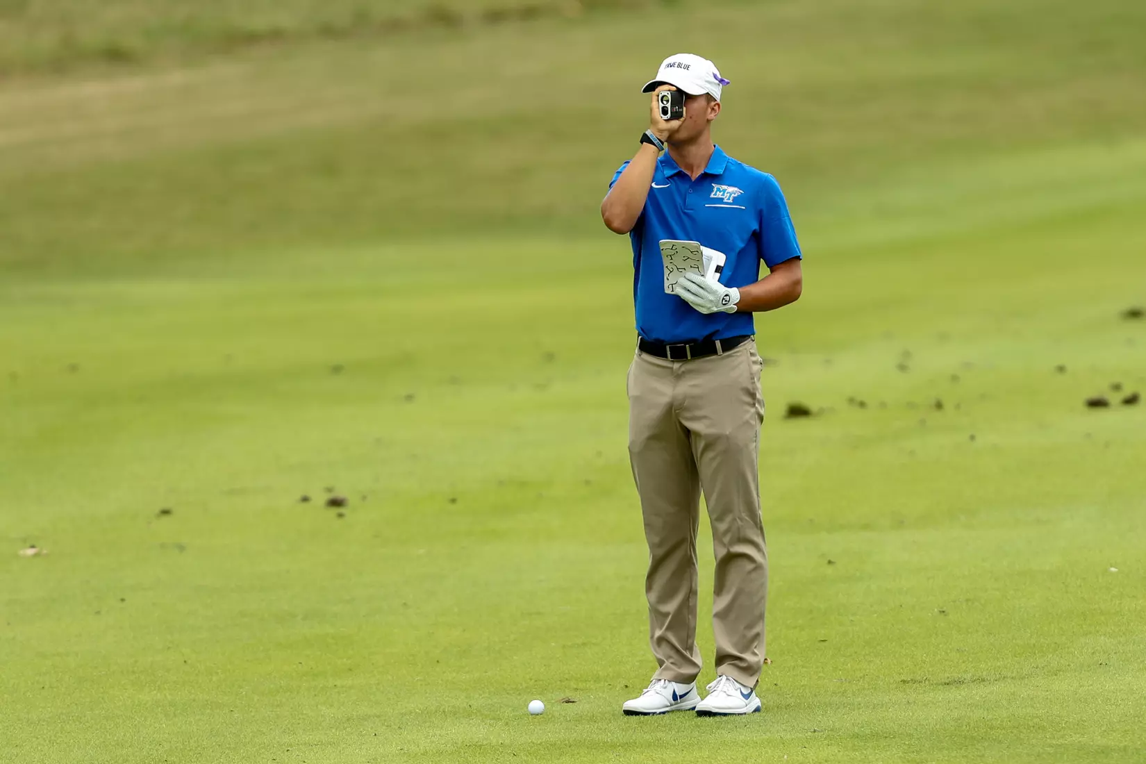 golfer standing with club