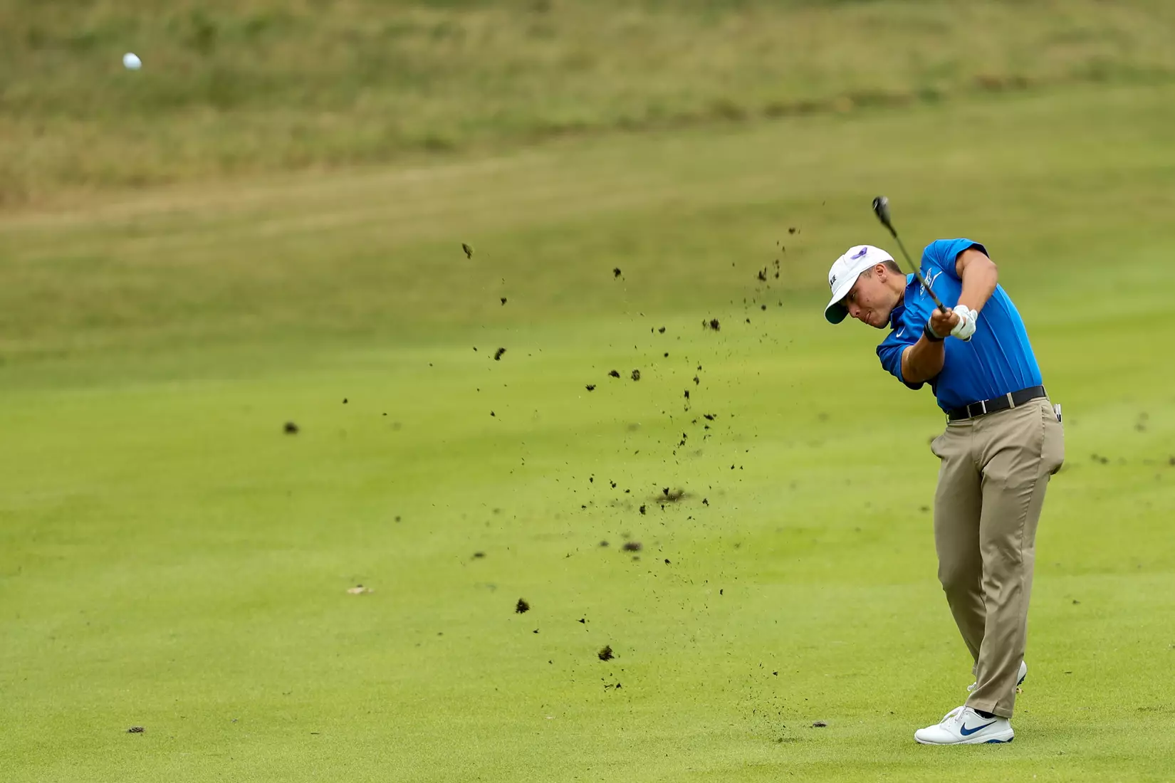 golfer standing with club