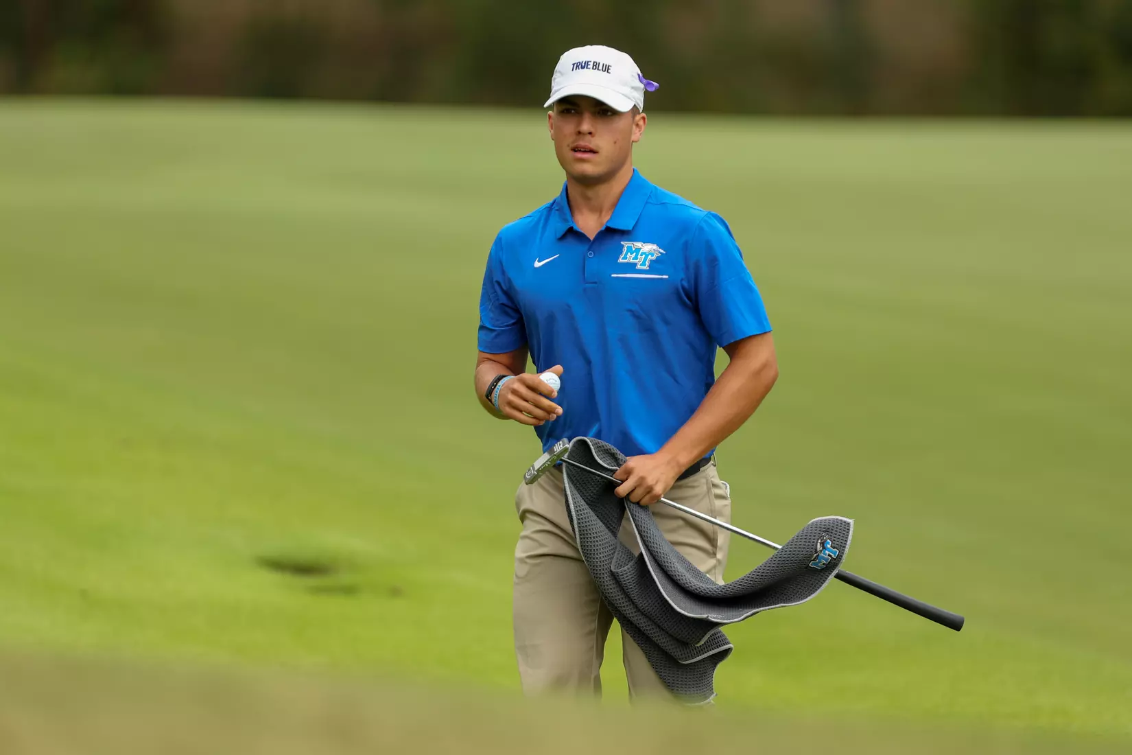 golfer standing with club
