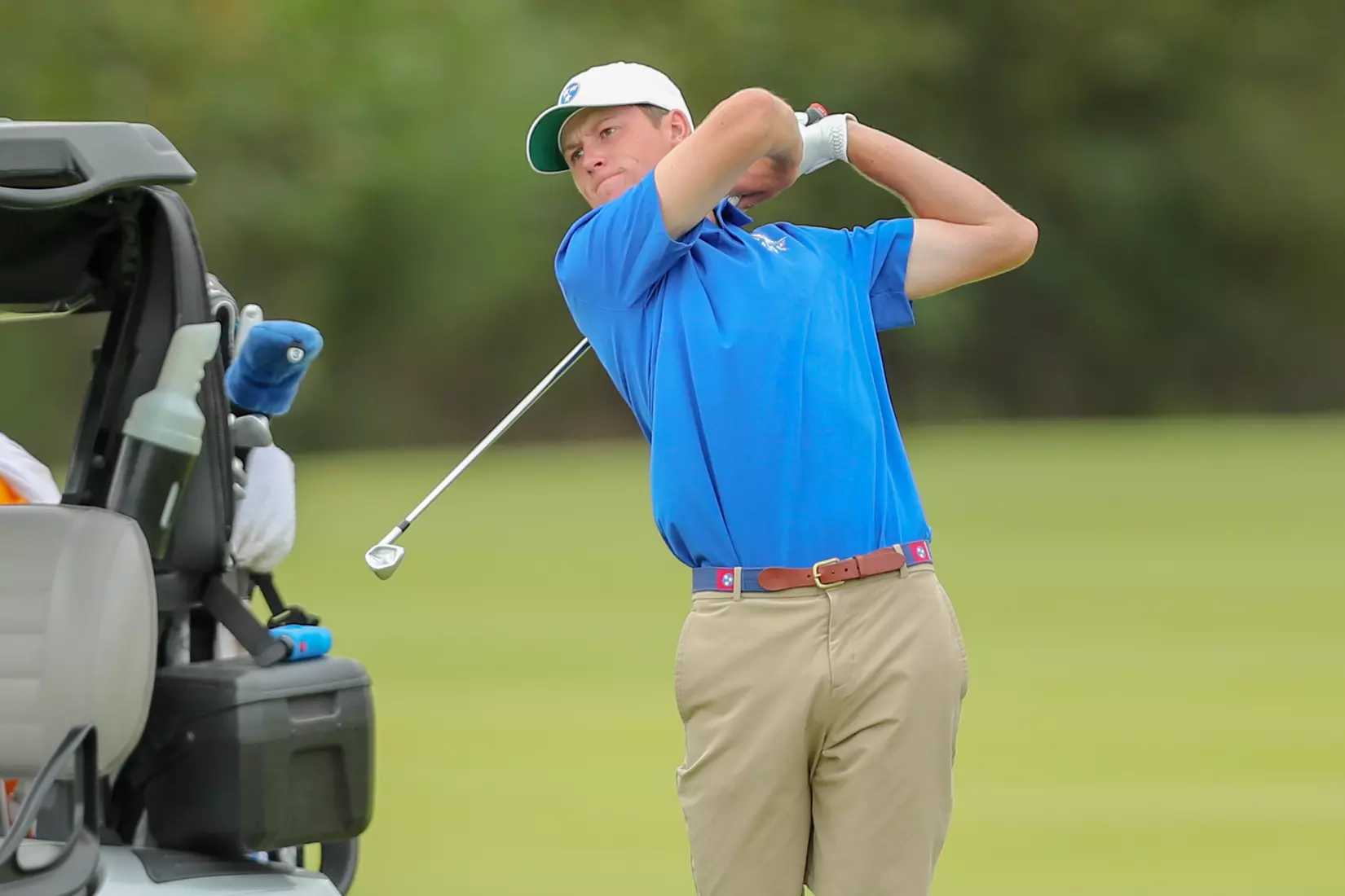 golfer standing with club