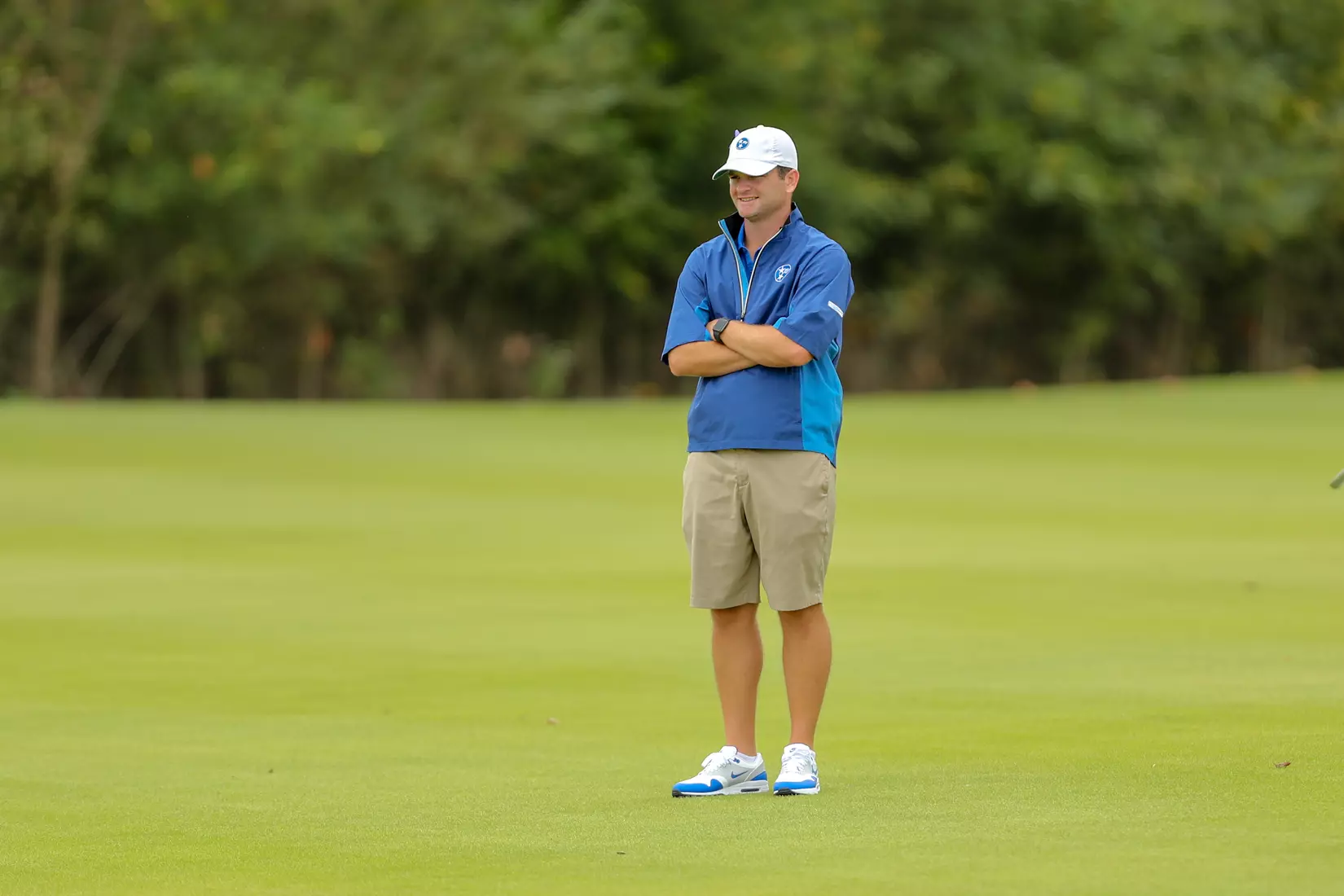 golfer standing with club