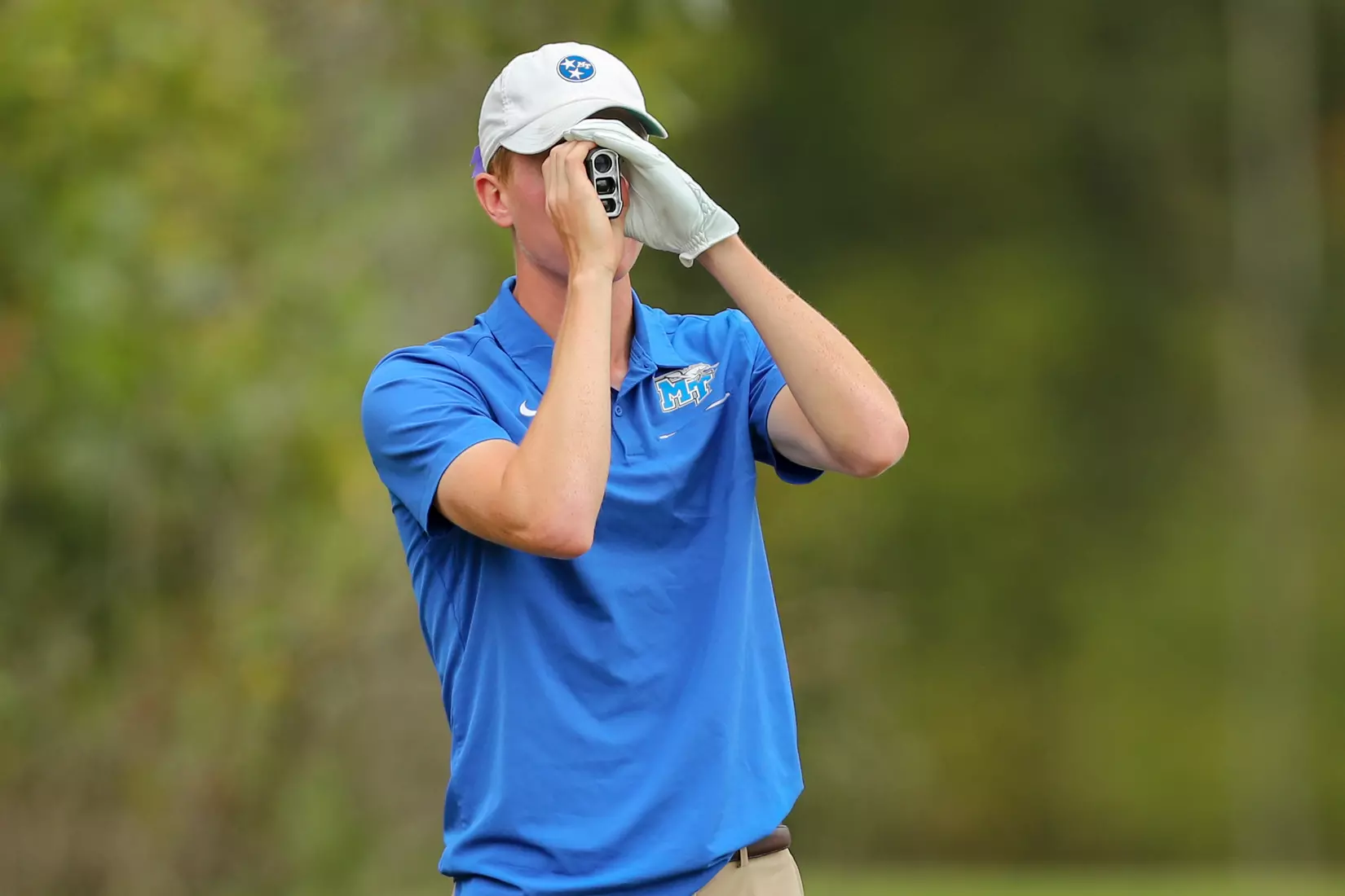 golfer standing with club