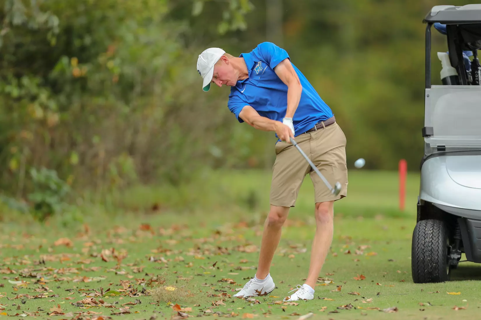 golfer standing with club