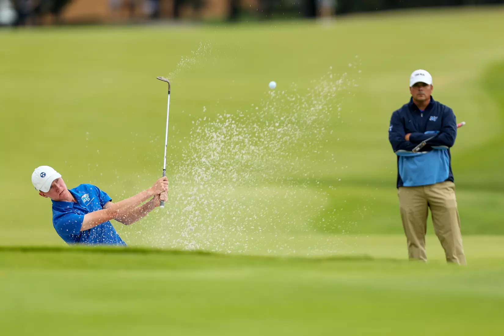 golfer standing with club