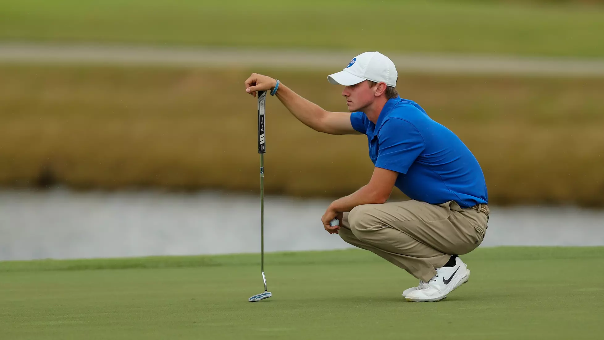golfer standing with club