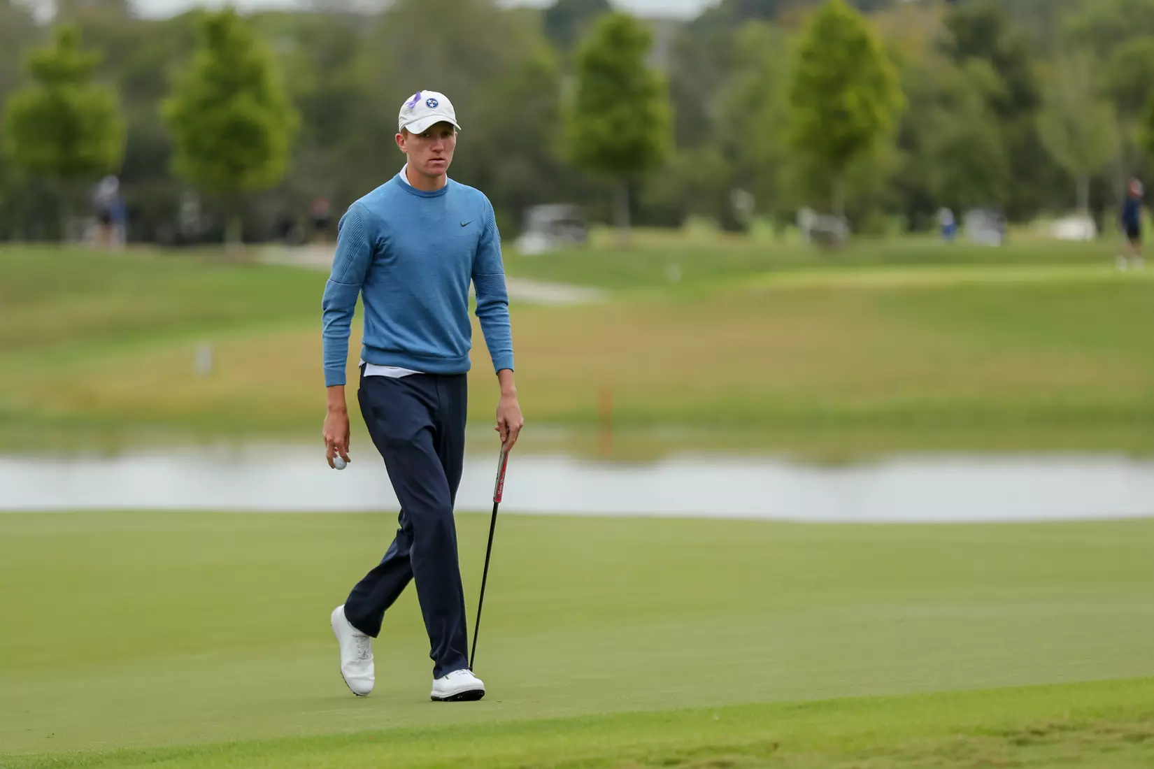 Walking across green