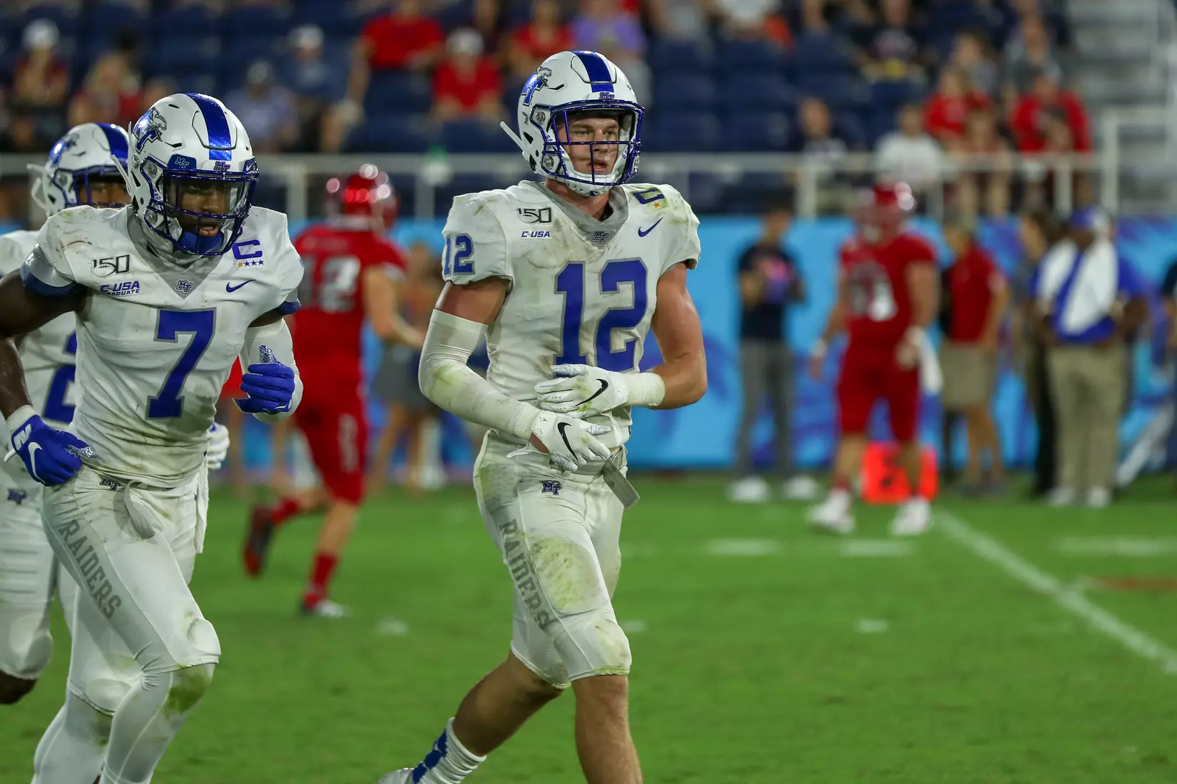 Reed Blankenship jogging off field after blocked PAT