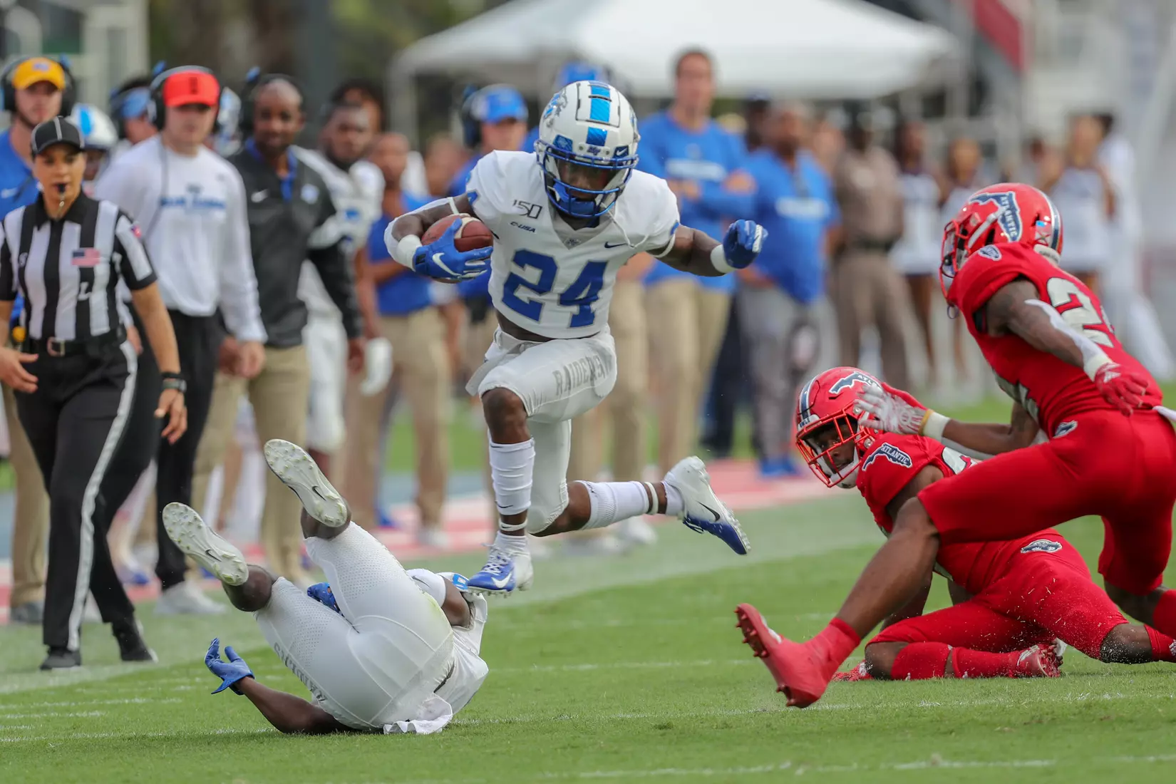 Dobson jumps over defender