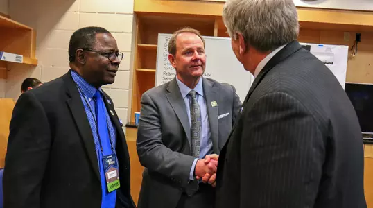 Davis with Massaro and McPhee