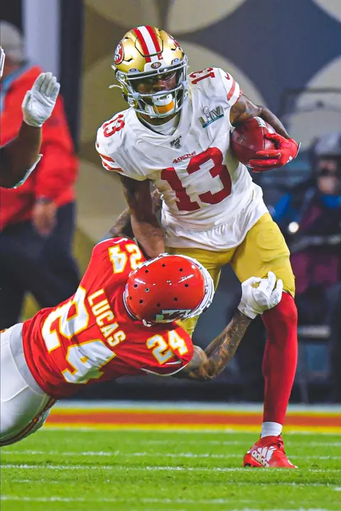 Kansas City Chiefs Jordan Lucas, left, tackles San Francisco 49ers Richie James during the second half of the NFL Super Bowl 54 football game Sunday, Feb. 2, 2020, in Miami Gardens, Fla. (AP Photo/Mark J. Terrill)