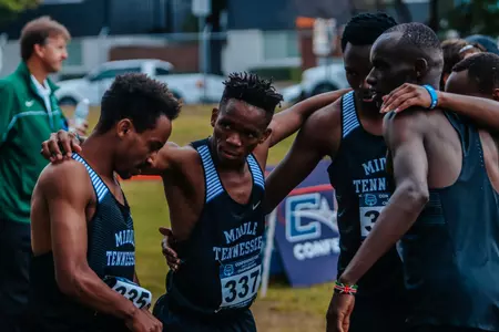men xc huddle at CUSA Championships 2022