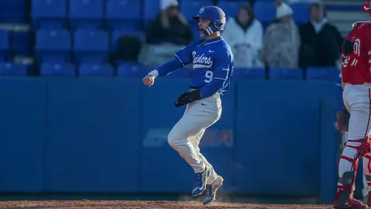 Eston Snider scores the first run of MTSU's seven-run eighth inning against Miami on February 24, 2024
