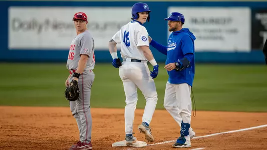 Jackson Galloway arrives at first base in a game against Miami (OH)