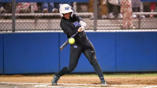 Jana Want hitting home run