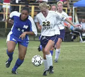Jenny Cox battles FIU's Alisa...