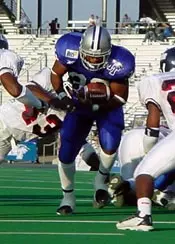 Dwone Hicks battles toward the...