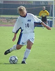 Freshman Lisa Langrish strikes...