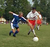 Britney Camden battles for a b...