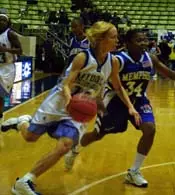 Senior Paula Penttila goes in ...