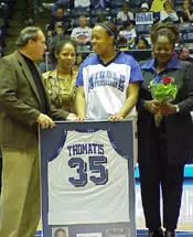 Senior Jamie Thomatis receives...