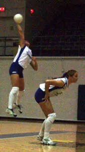 Dara McLean serves the ball ag...