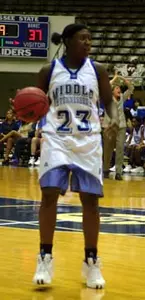 Sophomore Patrice Holmes score...