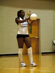 Middle hitter Karisse Baker wi...