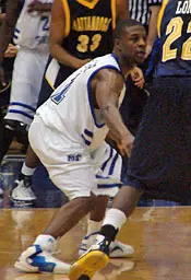 Senior guard Fats Cuyler poure...