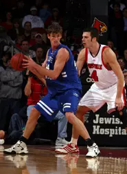 Kyle Young posts up Louisville...