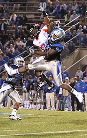 Senior Cam Robinson defends on...