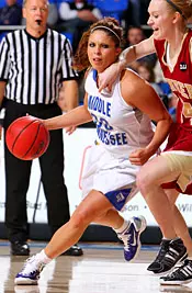 Lanning joins 1,000-point club in tight win