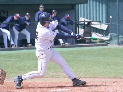 Two Big Innings Give Rebels Victory Over 'Breds Image