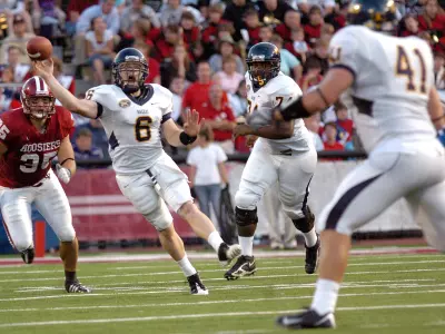 Racers Fall on Road at Indiana Image