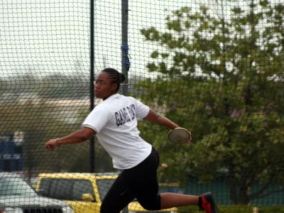 Track and Field Takes First and Breaks Four School Records at Racer Invitational Image