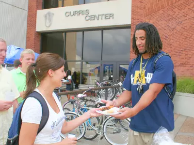 Racer Dogs anyone? Student-Athletes Serve Lunch Image