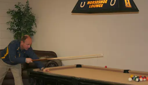 Hatcher playing pool