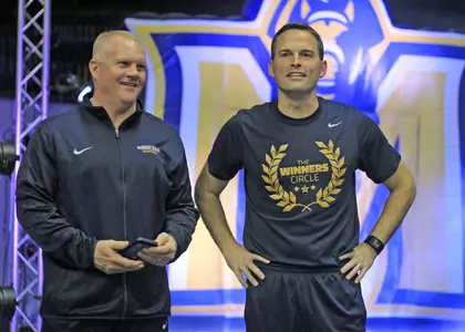 Coach Cross & Coach McMahon