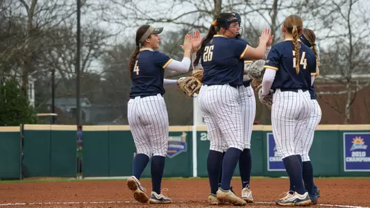 Racers Softball huddle