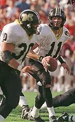 Missouri quarterback Jim Dougherty looks to pitch the ball during Saturday's loss to Oklahoma.
