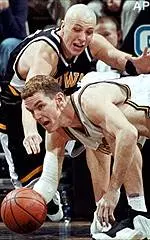 Missouri's Pat Schumacher scrambles for the ball in the first half of the 72-61 Tiger win Saturday.