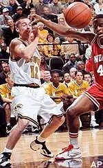 Missouri's Brian Grawer and Indiana's Lynn Washington both lose control of a rebound during the first half of their matchup Tuesday.