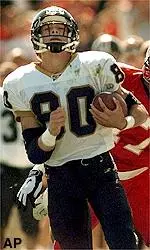 John Dausman outruns<br>ISU's Jeff Waters for<br>a first quarter TD.