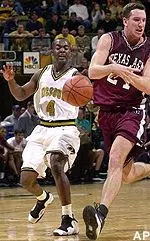 Clarence Gilbert forces a turnover from Texas A&M's Aaron Jack in the first half Saturday.