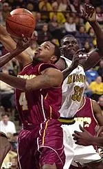 Winthrop's Derrick Knox and Missouri's Tajudeen Soyoye battle under the basket in the first half on Tuesday.
